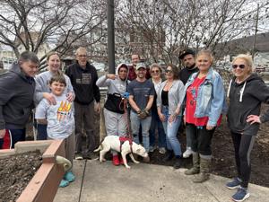 Volunteers prep city community gardens for spring planting
