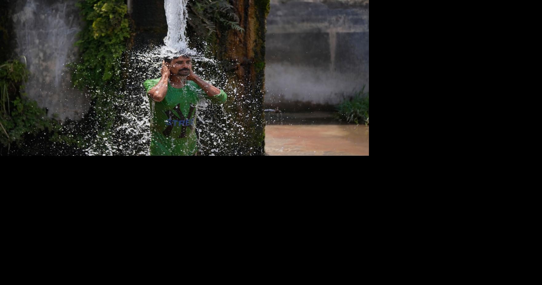 Photos show India sweltering under a severe heat wave | National ...