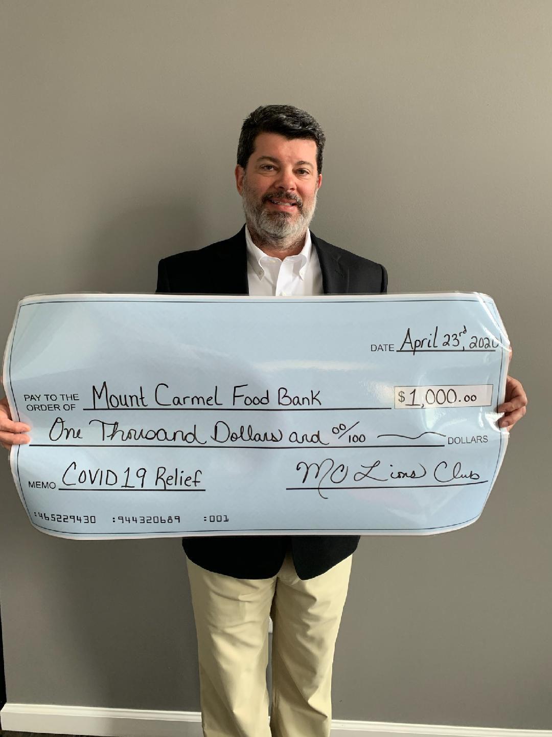 Lions donate to food pantry (copy)