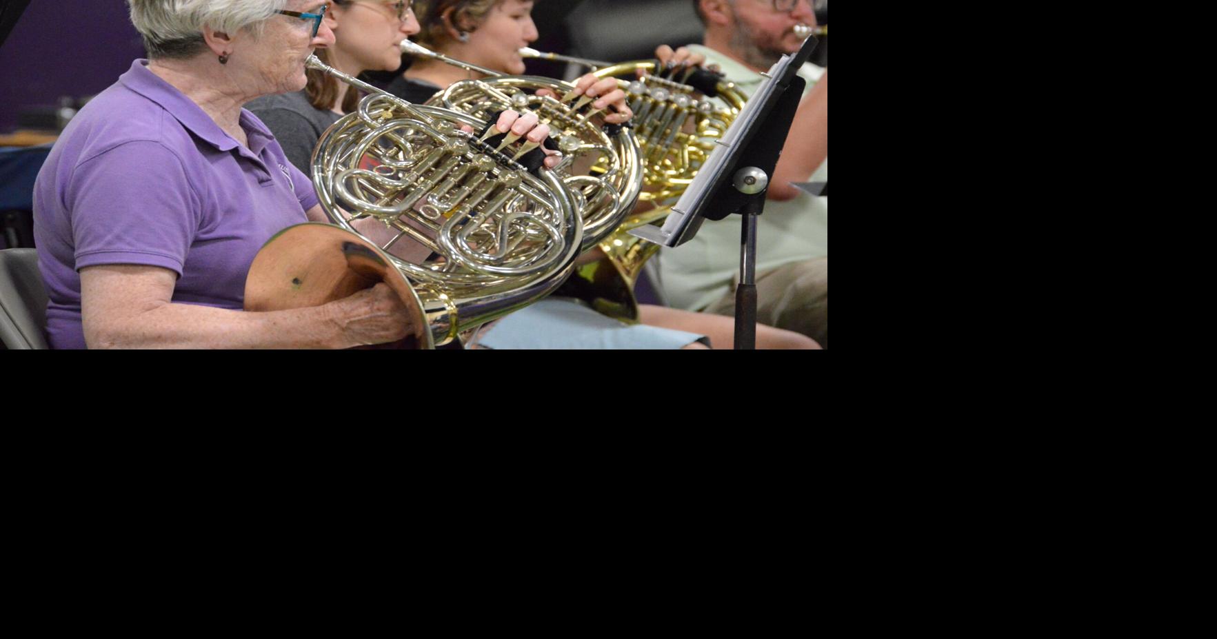 Anthracite Symphonic Band musicians warm up for Americana concert on Thursday