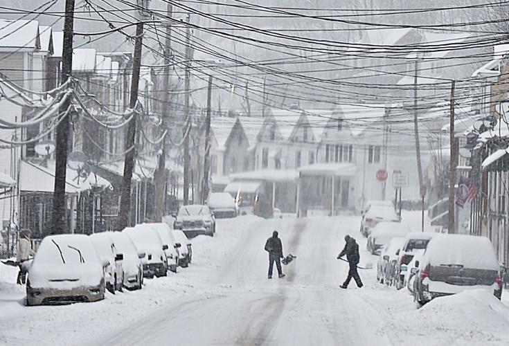 Snowstorm continues to sweep through area Local