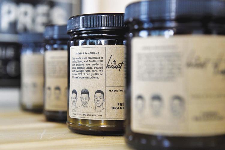 Three young Maryland brothers start candle company with charity in mind