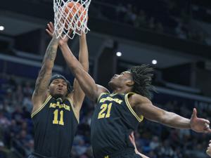 Cason leads No. 2 Michigan to 74-72 win over Penn State