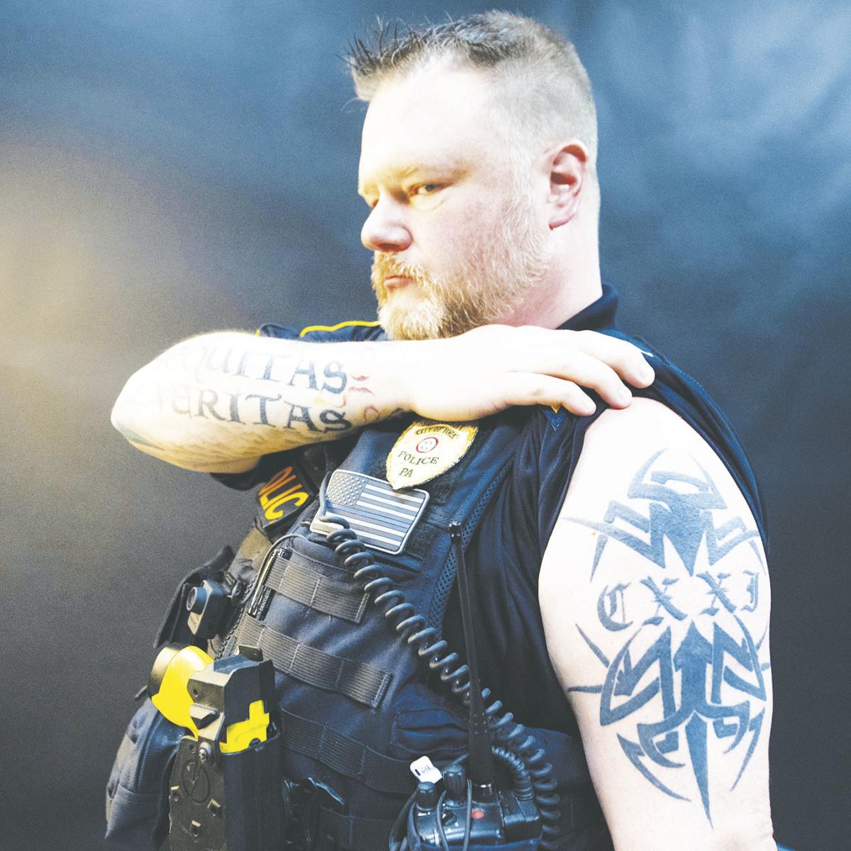 Officers' tattoos share personal meaning, help them connect Arts