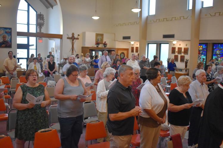 More than 100 attend Mass with Gainer Local
