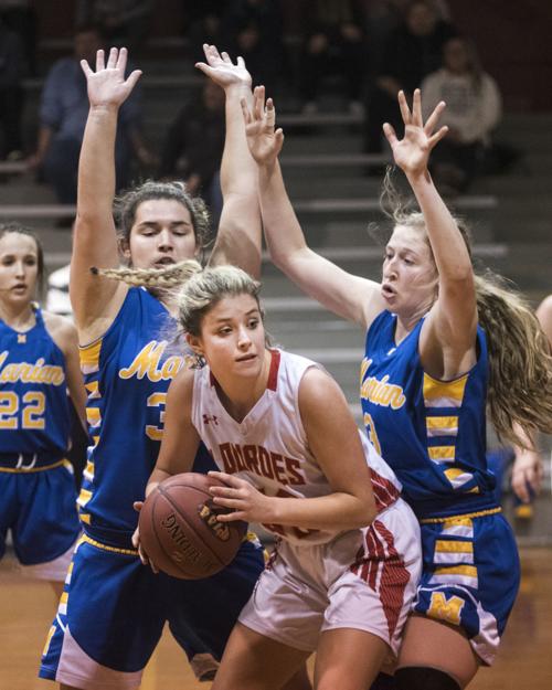 Marian Catholic nips Our Lady of Lourdes