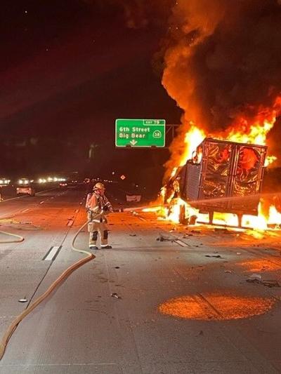 Firefighters extinguish burning tractor trailers on Interstate 10 ...