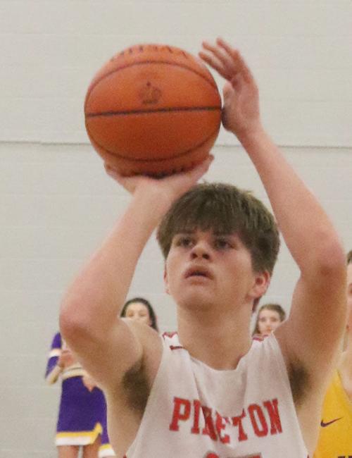 Friday night basketball action, Page B1
