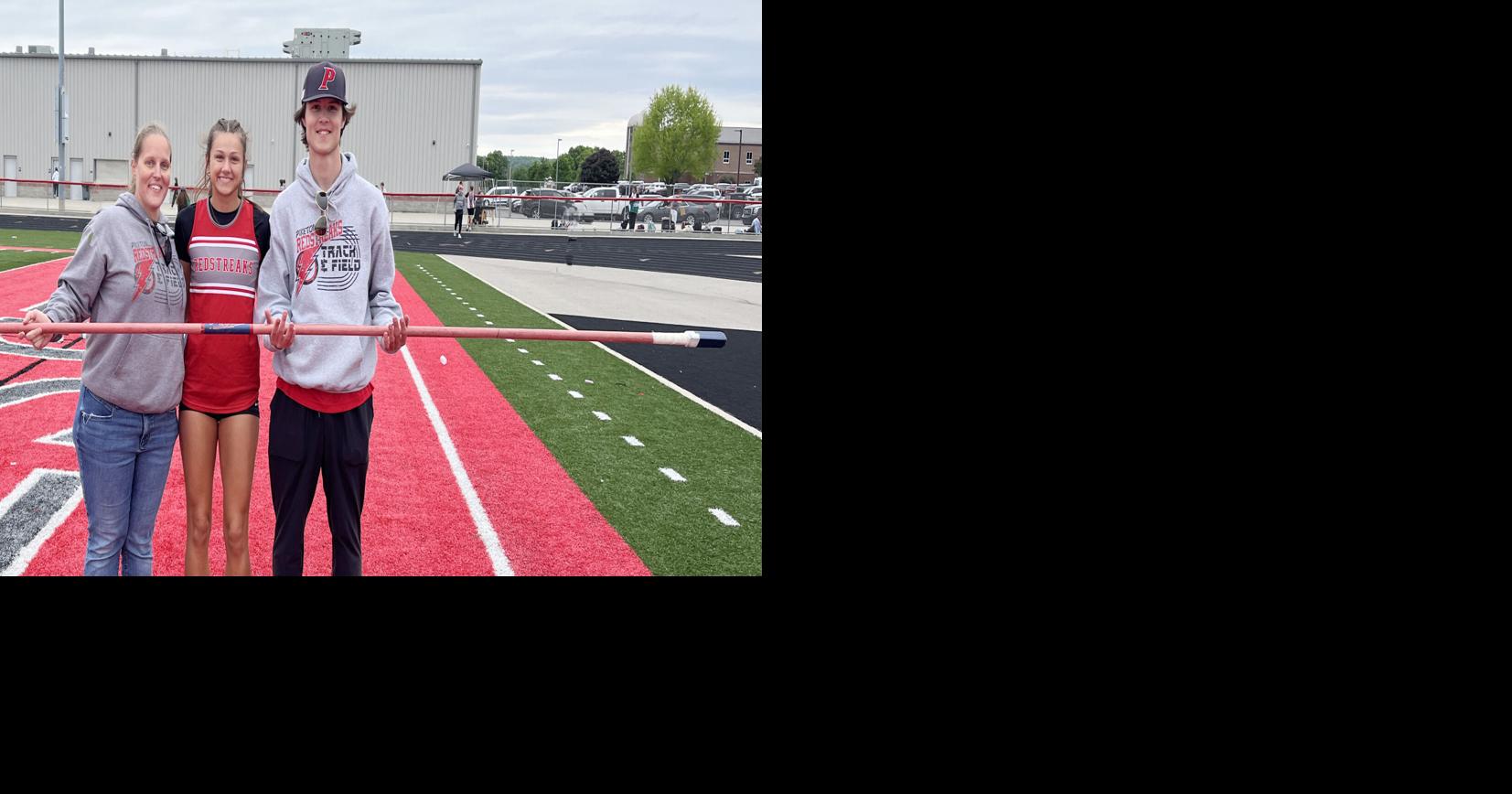 Sneaking in a school record ... Moore leaps to new heights in high jump ...