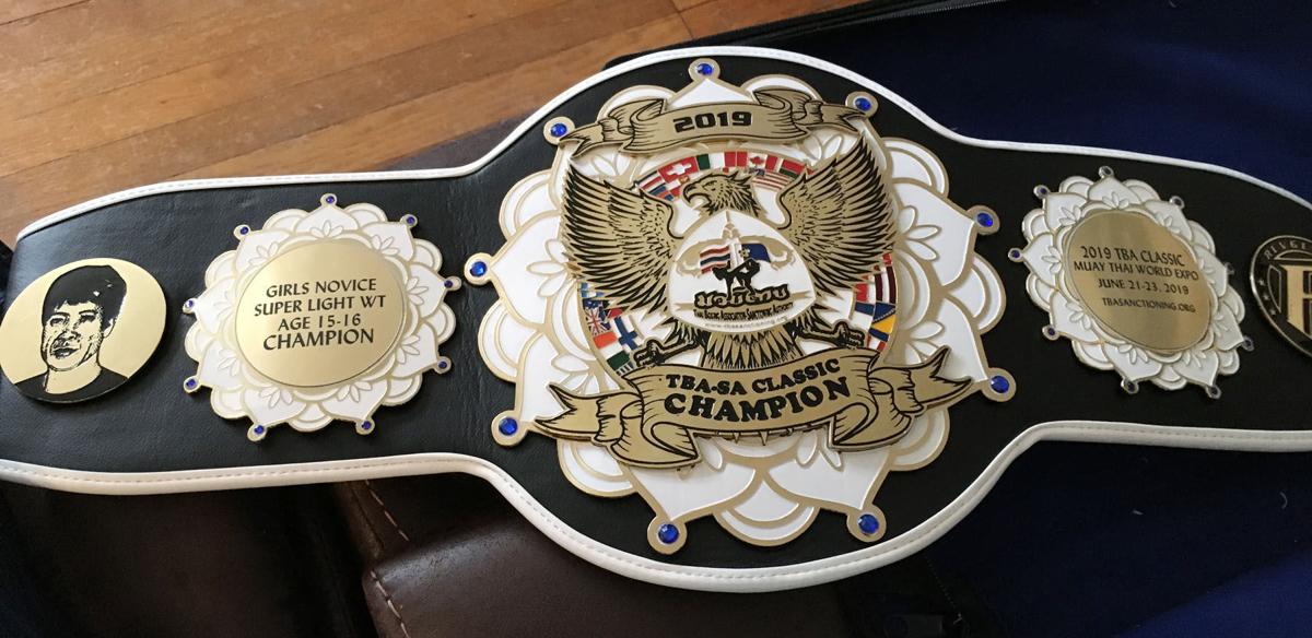 Title fighter Morris wins championship belt in national Muay Thai