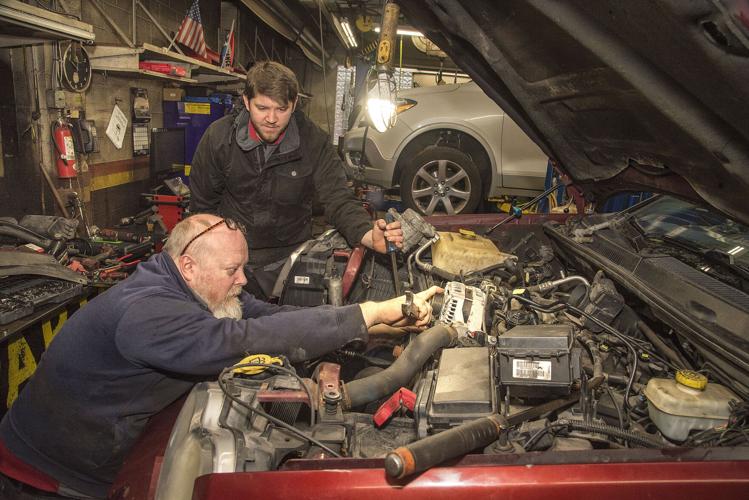 Auto repair shop owners celebrating first year in business in the Falls