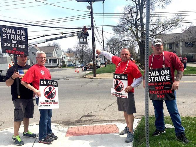 Verizon strikers protest at work site