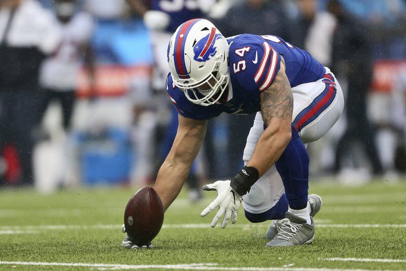 Buffalo Bills safety Jaquan Johnson (4) runs onto the field before the  start of an NFL