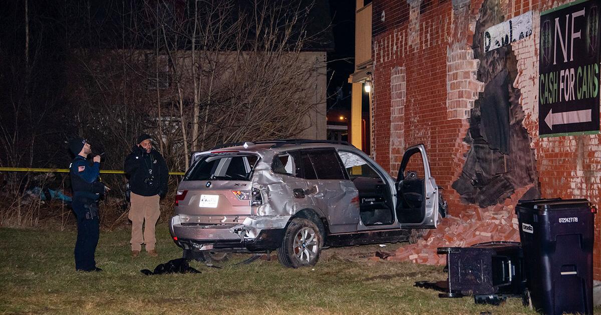 Driver hospitalized after BMW crashes Into Highland Avenue building