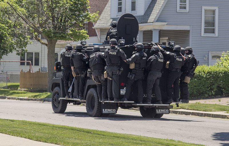 Image result for Police raiding homes