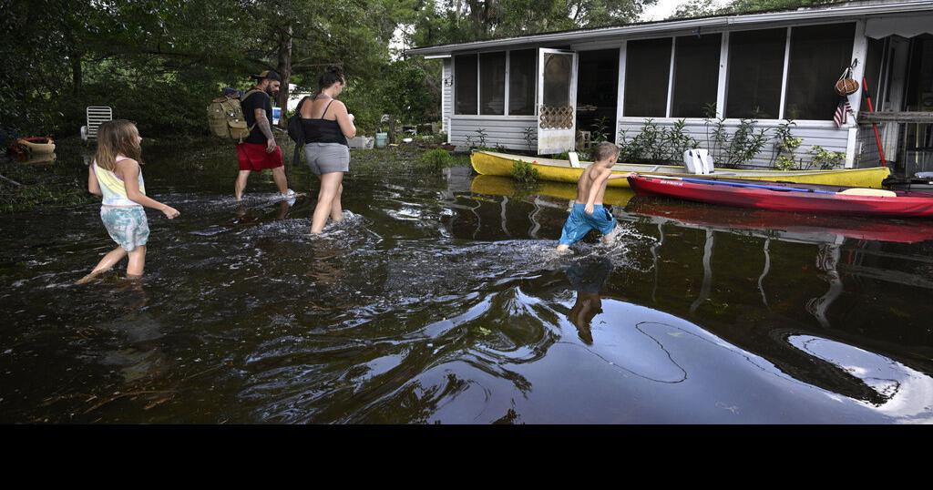 At least 52 dead and millions without power after Helene's deadly march