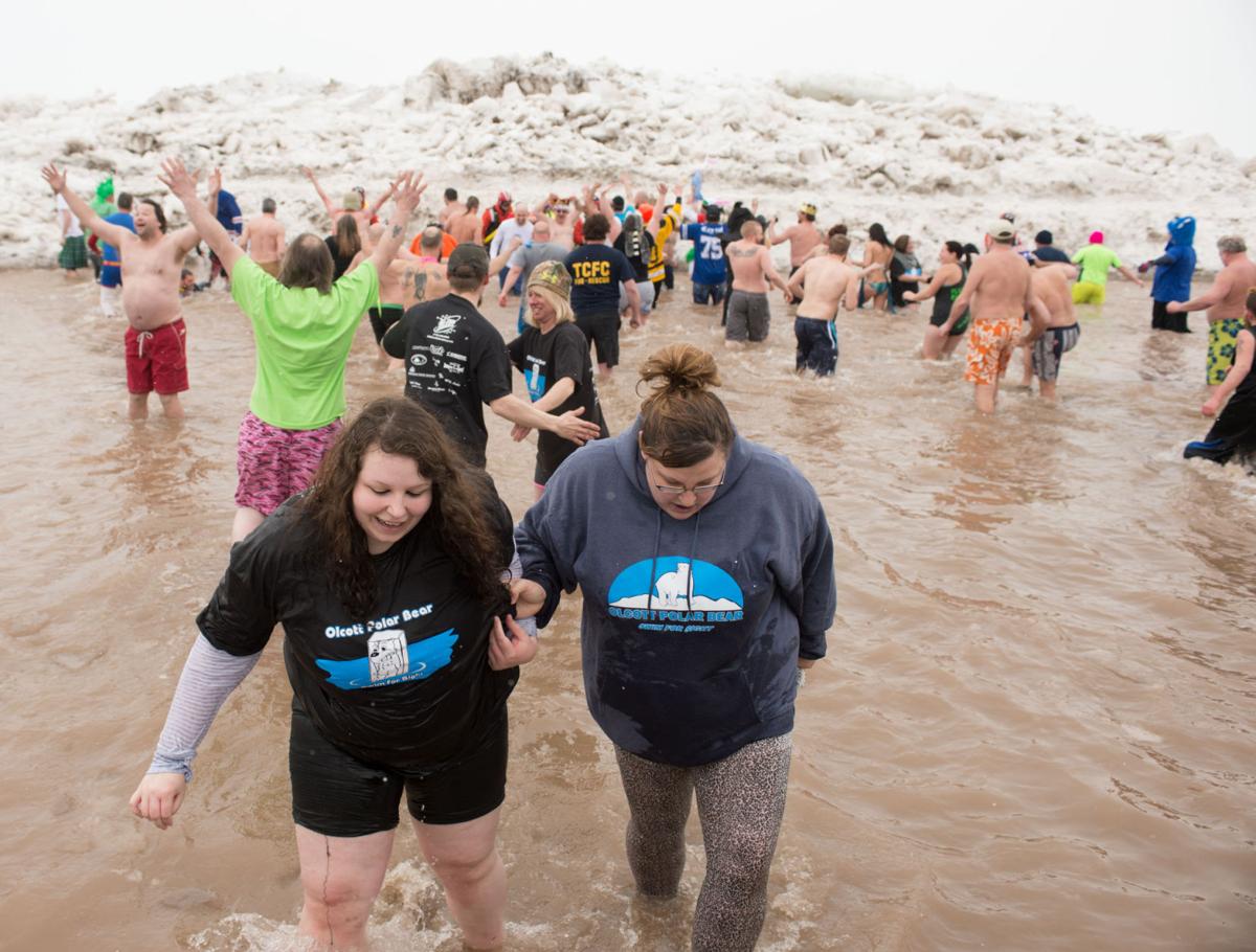 SLIDESHOW Polar Bear Swim for Sight draws hundreds to Olcott Gallery