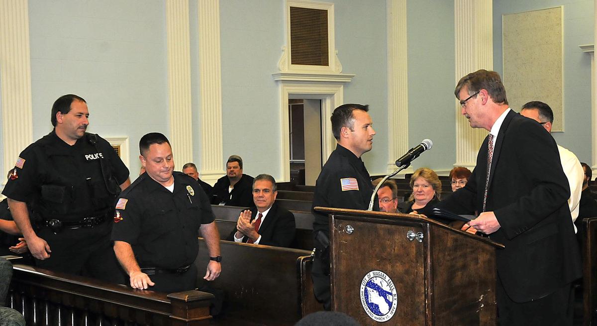 Falls police officers honored for saving woman’s life Local News