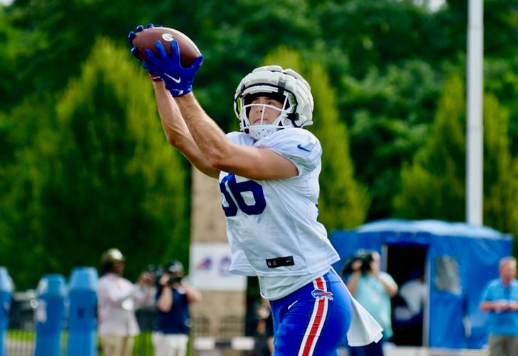 Buffalo Bills TE Dawson Knox gets an autograph from QB Josh Allen