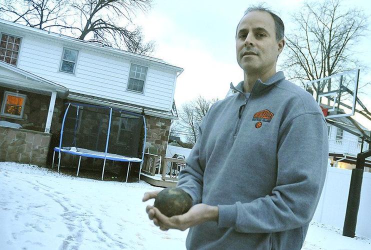 History teacher's thinks backyard cannonball is from 17th century ship