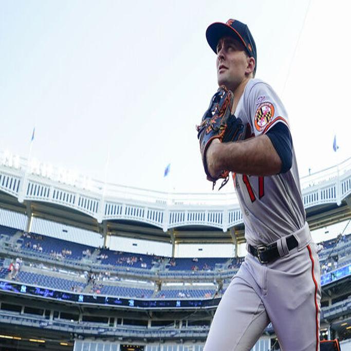 Baltimore Orioles' Adam Frazier follows through on a swing during