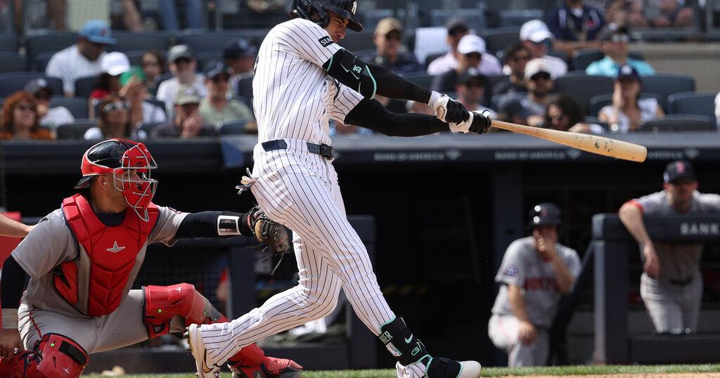 Bellinger and Chisholm hit 8th-inning homers that lead the Yankees over the Red Sox 6-1