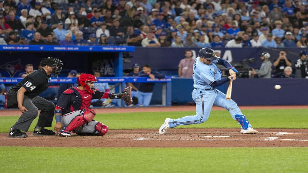 Jansen homers, drives in winner in 11th as Jays beat Cubs