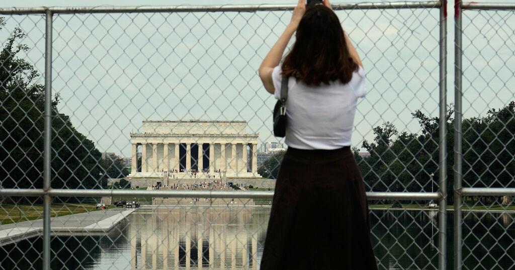 Reflecting Pool that has long enticed visitors now gains police scrutiny under Trump