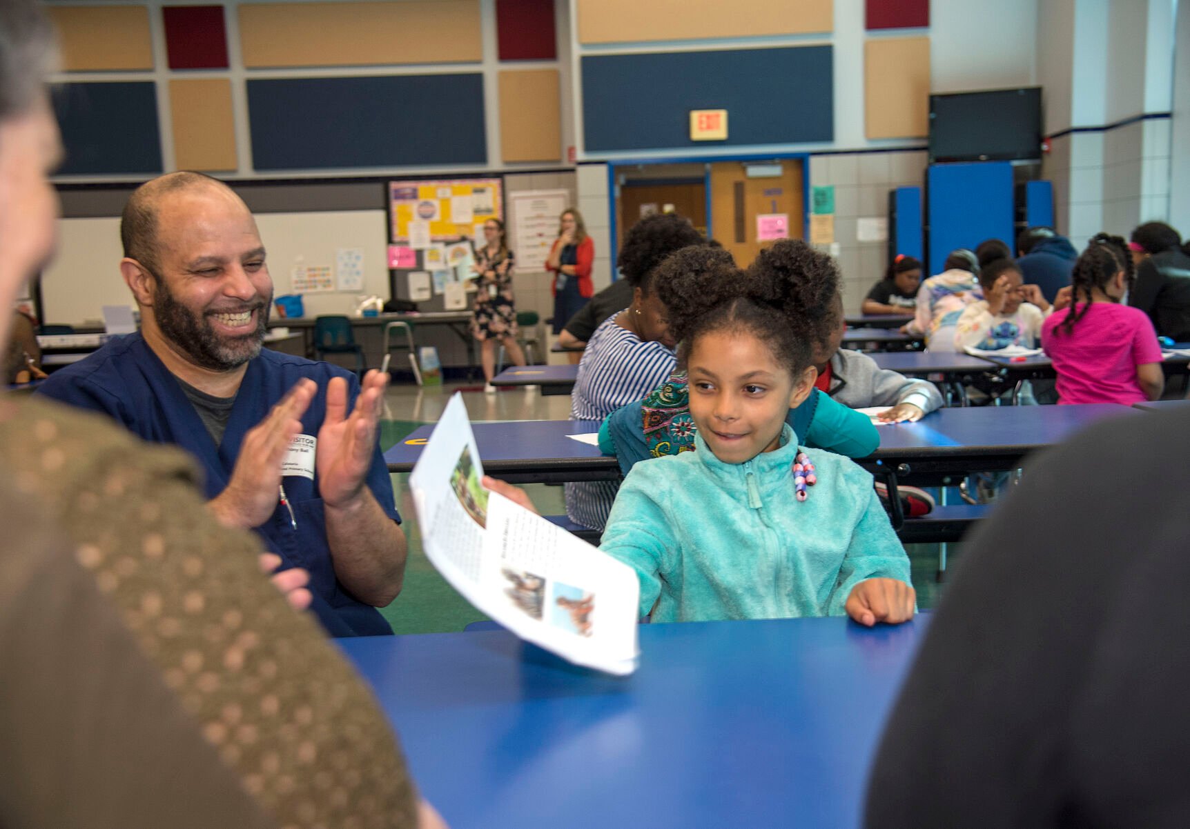 230511 Reading To Family 4.jpg | | niagara-gazette.com