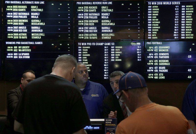 Fantasy sports businesses move to put odds in their favor