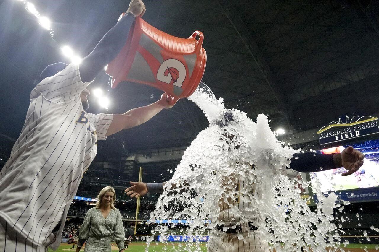 Blake Perkins hits grand slam, Brewers hold off Reds for 10-8 win