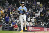 Marlins prevent Brewers from clinching NL Central with 5-4 win and