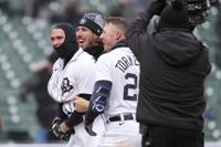 Carpenter homers twice to help Lorenzen and the Tigers beat the Mariners 6-0