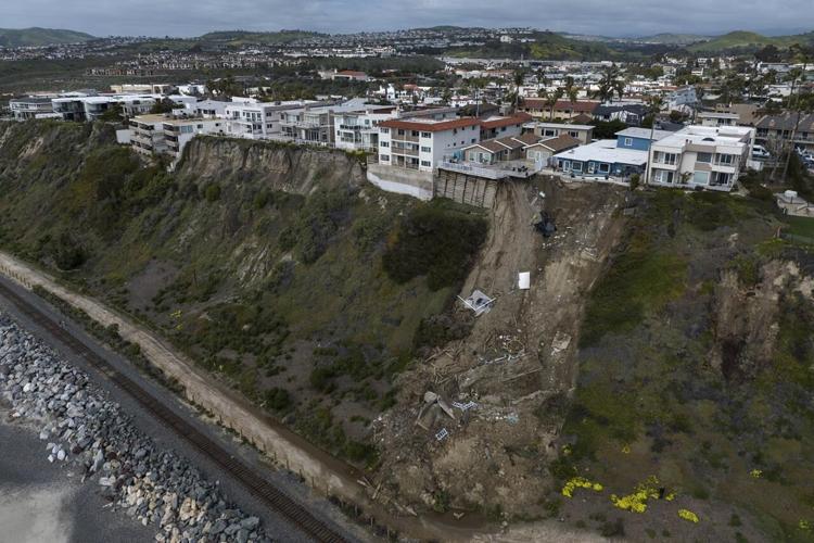 California buildings still in peril from tumbling cliff