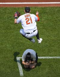 Baltimore Orioles' Adley Rutschman follows through on a swing during the  first inning of a baseball game between the Baltimore Orioles and the  Toronto Blue Jays, Thursday, Aug. 24, 2023, in Baltimore.