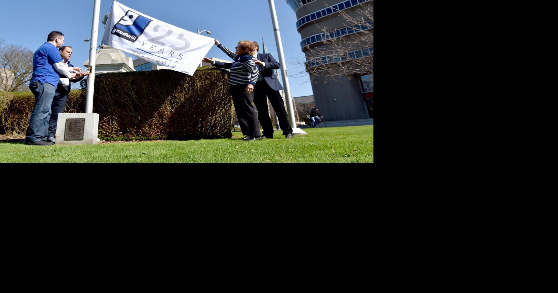 Goodwill Niagara flag raised celebrating 25 years of community impact