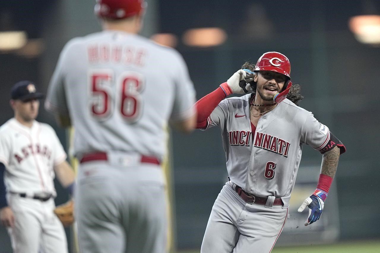 Reds push winning streak with an 8-6 victory over Rockies