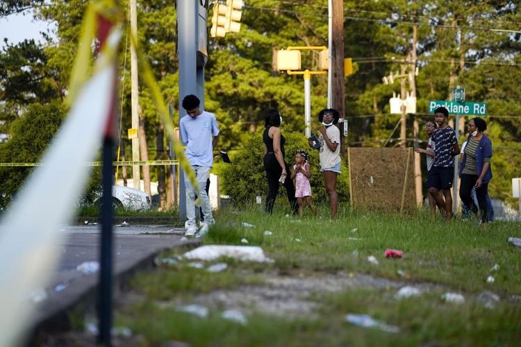 Community mourns teenager’s death after gas station owner charged with ...