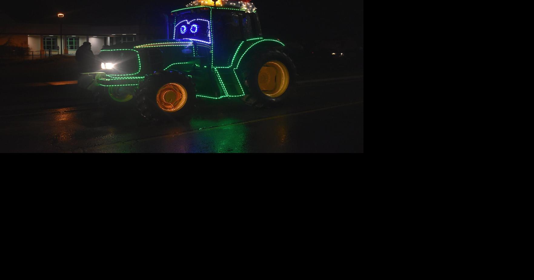 Bright lights make for warm glow at Christmas Tractor Parade