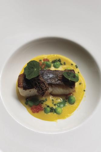 A course at Marlena Summer Camp stars pan-seared black cod in a Brentwood corn nage, along with morels, English peas and fava beans. | Photo courtesy of Tara Rudolph