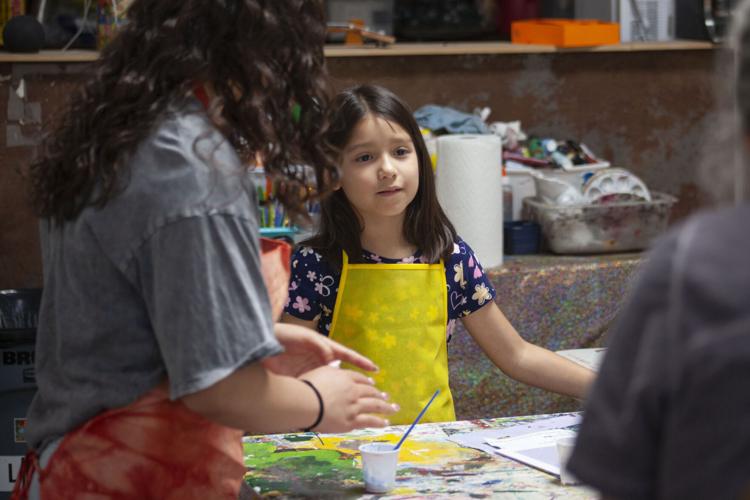 Local kids dive into papermaking process Community