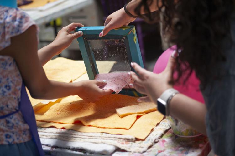 Local kids dive into papermaking process Community