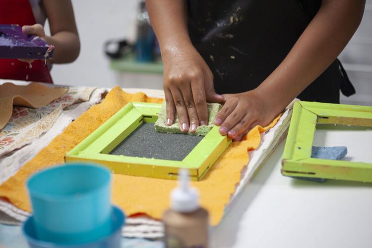 Local kids dive into papermaking process Community