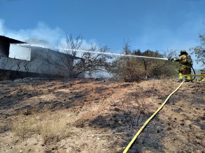 Fire burns backyard and outbuilding in Meadow Hills, but homes spared Local News