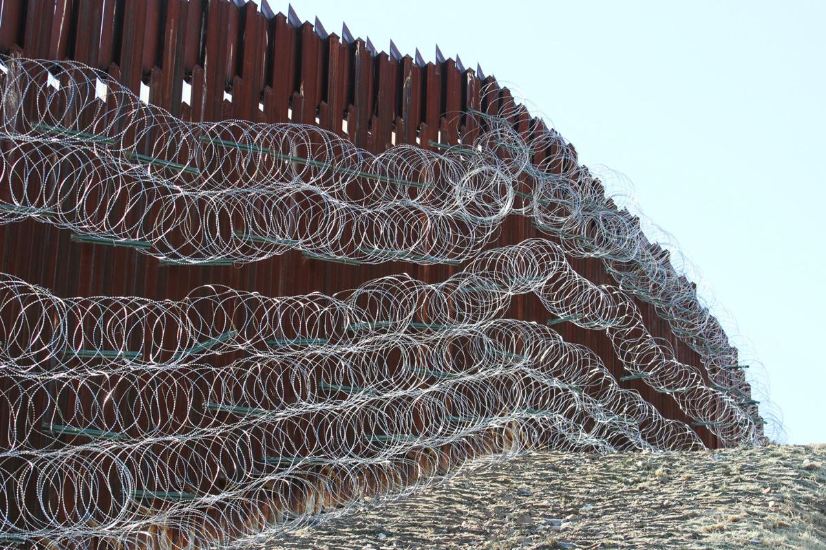 Gallery Concertina wire on the border fence Gallery