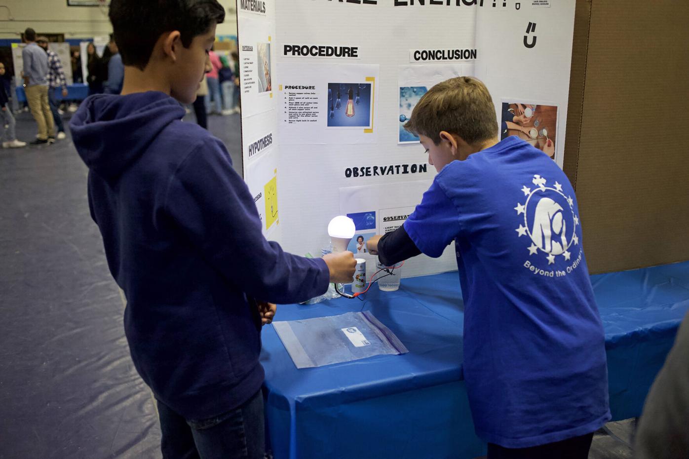 Lourdes students test hypotheses at science fair | Local News |  nogalesinternational.com