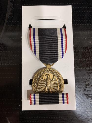 Tiger Medals - Court mounting military medals (overlapping medals