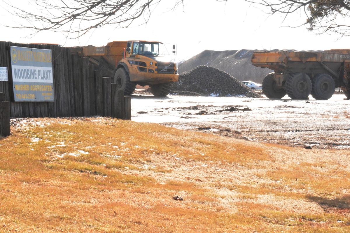 Authorities work to recover body from truck submerged in sand pit State & Region