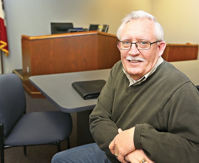 Retiree volunteers for Iowa's child welfare system