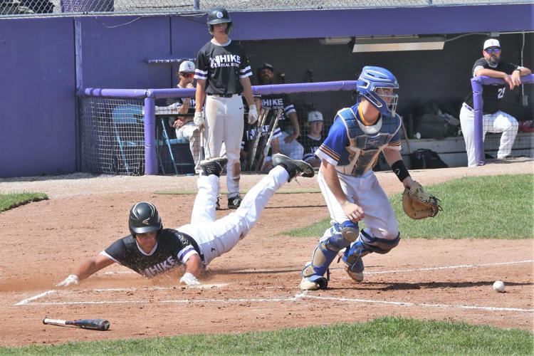 Parker Schuyler slides home.JPG